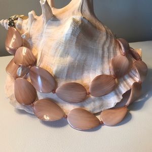 Stunning dual strand peach colored necklace